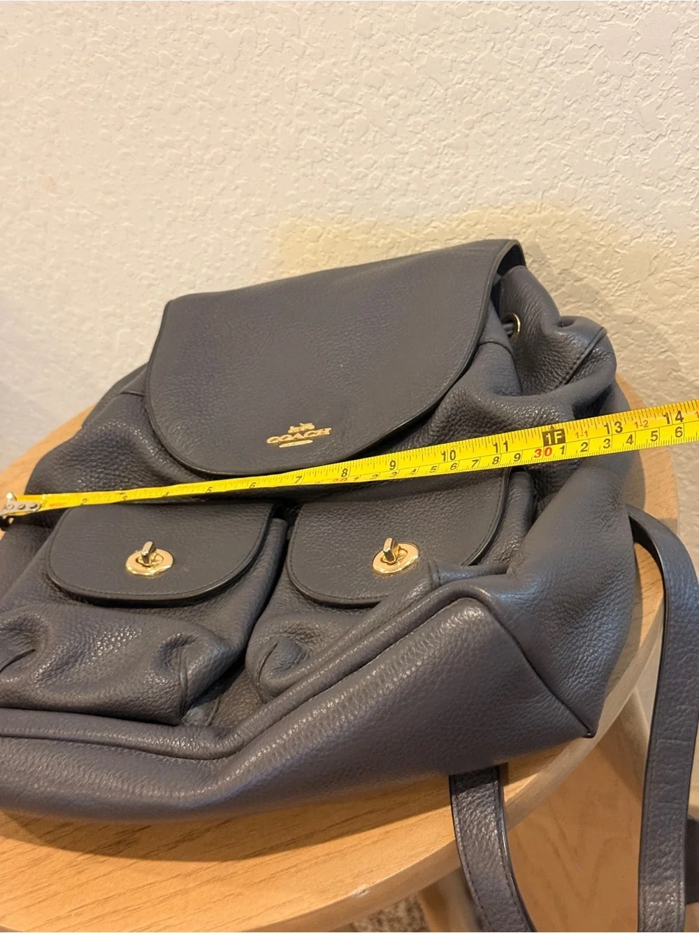 COACH Black Pebbled Leather Drawstring Backpack with Front Pockets
